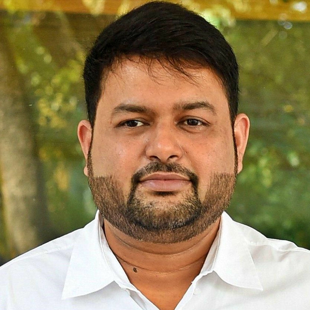 Thaman S