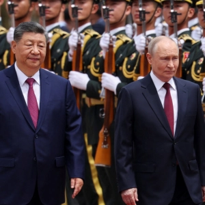 Xi greets Putin in Beijing - days after Trump's China visit