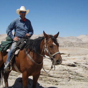 Ranger JD Swed, a flathat, and a horse