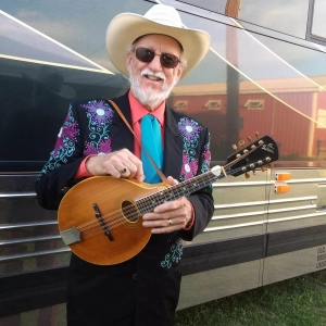 Legendary Doyle Lawson talks "Ira Louvin's mandolin" with Katy Daley