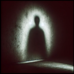 Shadow at the end of the road