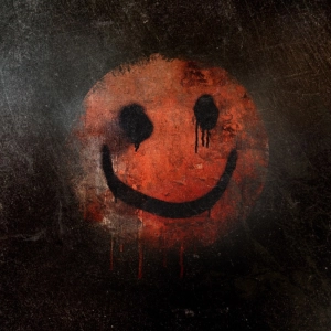 El asesino de la cara feliz