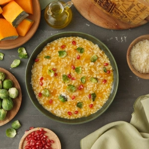 Risotto a la calabaza con chips de verduras y queso Grana Padano